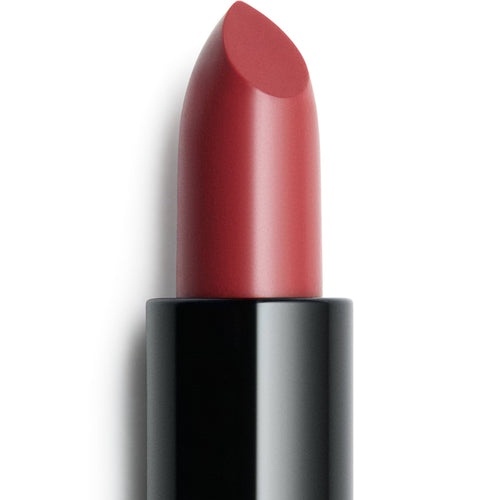 ANIÉ Rio cream lipstick in muted plum brown, close-up of the bullet