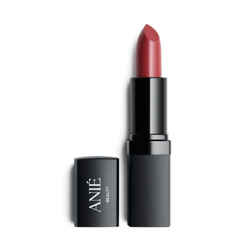 ANIÉ Rio cream lipstick in muted plum brown, bullet with black cap